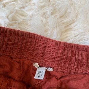 Embroidered rust colored flowy shorts